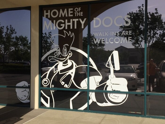 Home Of The Mighty Dogs Window Graphics In Corona, CA - Majestic Sign Studio